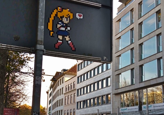 Road sign with a Sailor Moon sticker on the back, Bremen. 04 Nov 2022. Personal archives.